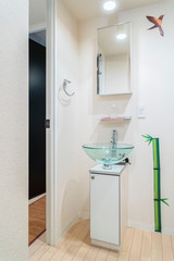 Glass basin In the bathroom decorated in Asian style