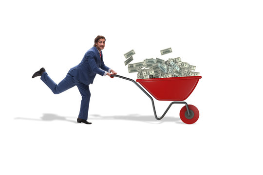 Businessman Pushing Wheelbarrow Full Of Money