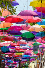Fototapeta na wymiar A variety of colorful umbrellas