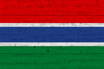 Gambia flag painted on old wood plank