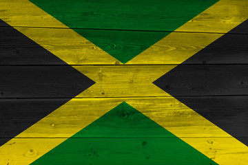 Jamaica flag painted on old wood plank