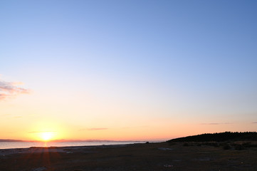 Fototapeta na wymiar 富津岬の夕日　Sunset on the beach, Futtu-city, Chiba, Japan