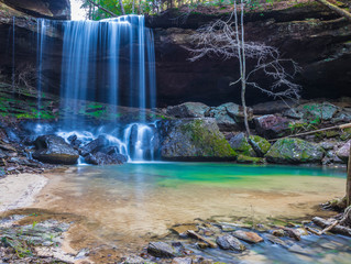 The Beautiful Sougahoagdee falls and the blue waters of Bankhead National Forest