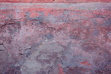 The texture of the old cement wall with scratches, cracks, dust, crevices, roughness, stucco. Can be used as a poster or background for design.