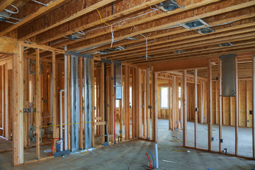 Interior framing beam of new house under construction home framing