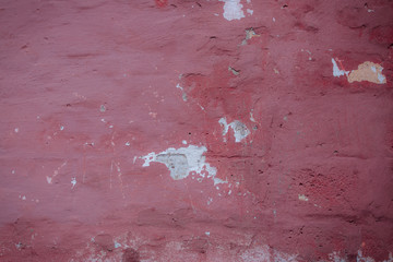 The texture of the old cement wall with scratches, cracks, dust, crevices, roughness, stucco. Can be used as a poster or background for design.