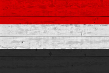 yemen flag painted on old wood plank