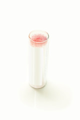 Medical capillary glass tube in container on white background with shadow. Designed for both safe blood collection as well as accurate micro-hematocrit determinations Precision.