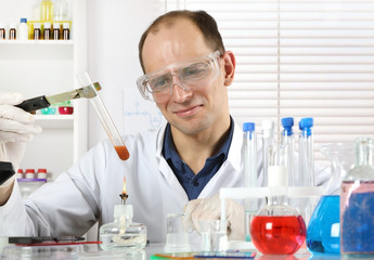 Young scientist in the chemical laboratory