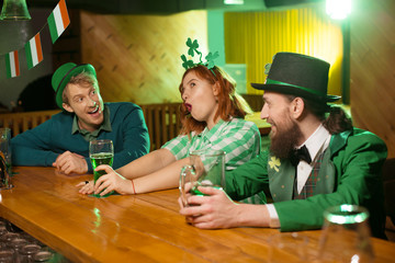 Red-haired pretty girl in green checkered shirt feeling wonderful