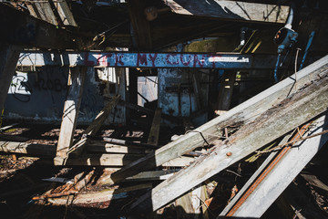 Old abandoned ruins with graffiti, moss and grime