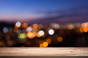 empty table from a light wood with bokeh background