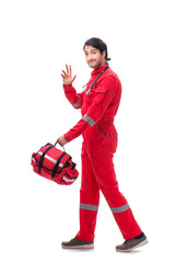 Young paramedic in red uniform isolated on white