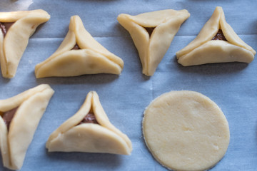 Preparing batch of hamantaschen for Purim Jewish Holiday- Israel