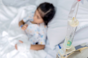 clinic heal kid Fluids Intravenous to blood vein in hosital room.
