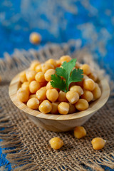 chickpea on blue wooden surface