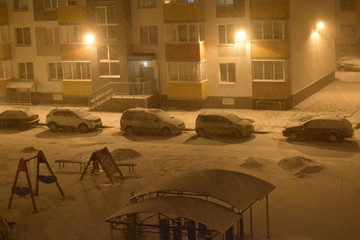 buildings and a car in the winter