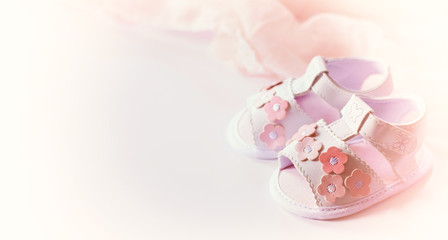 children's small shoes close-up. background with white sandals.