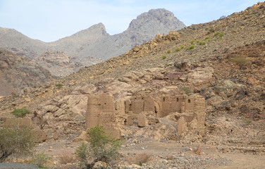 Burgruine vor Gebirge, Oman Al Hamra