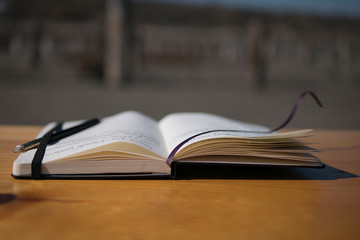 Notebook on the table in nature