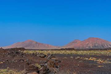 Spain, Lanzarote, Red mountains of fire, volcano landscape