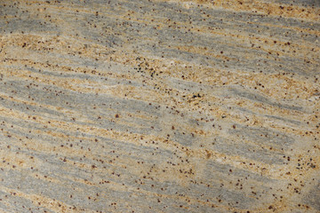 Background natural stone beige with gray, called granite Juparano Colombo
