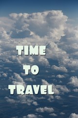 inscription time to travel in the blue sky with clouds