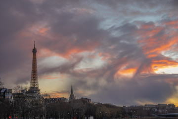 Obraz premium Paris, France - 03 17 2019: Quays of the Seine. View of Eiffel Tower from Alexander III Bridge