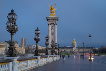 Fototapeta na wymiar Paris, France - 03 17 2019: Quays of the Seine. Alexander III Bridge