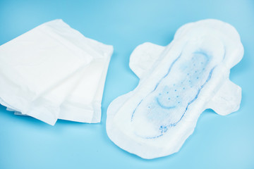 Sanitary napkins pad for women on color background.