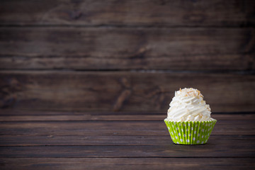 cupcakes on old dark wooden background