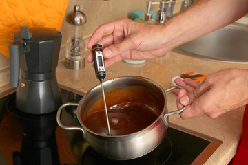 The process of cooking milk chocolate cream for traditional