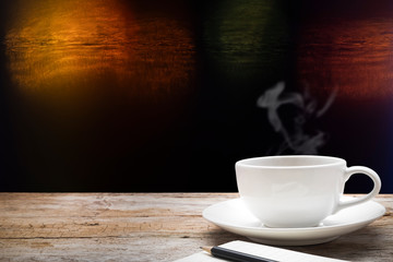 Wooden table with blur night bokeh background.