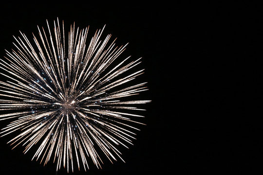 Close-up photo of fireworks exploding in the night sky