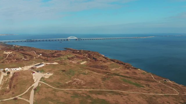 Aerial panoramic view from Kerch penisula to famous Crimean Bridge conncecting Taman and Crimea.