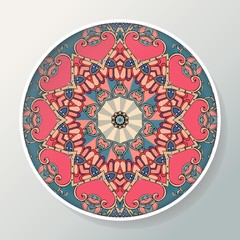 Decorative plate with mandala in ethnic style. Oriental round ornament with indian motifs.