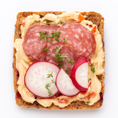 Sandwiches with cream cheese, vegetables and salami.