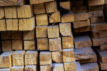 lumber many square long blocks stack pile light beige design base web building pattern end boards