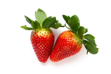 Ripe half strawberry isolated on white background.