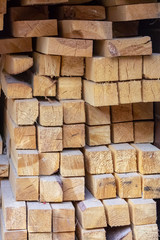 wooden construction background light beige square beams stack of materials base site pattern