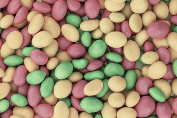 tinted background yellow pink green texture colorful design festive base set lots of dragees