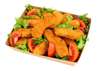 Breadcrumb covered chicken and salad in a cardboard takeaway tray isolated on a white background