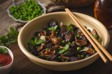 Homemade thai meat with forest mushrooms