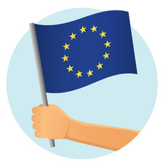 Europe EU flag in hand