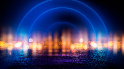 Neon circle, wet asphalt, reflection. Neon circle with the center of a dark empty scene with spotlights. Abstract light. Lights of the night city, abstract light bokeh, smog, smoke.