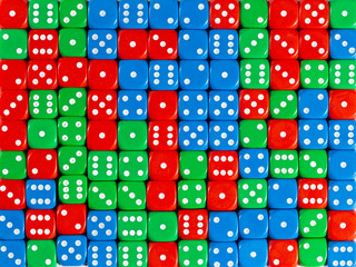 Background pattern of random ordered red, green and blue dices