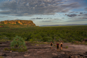 tourists walking down from the Nadab Lookout in ubirr, kakadu national park - australia, northern territory © Martin