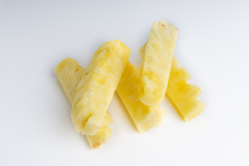 Pineapple with slices isolated on white background. Selective focus