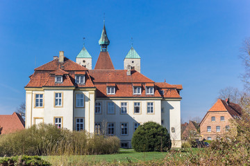 Castle and garden in the historic center of Freckenhorst, Germany