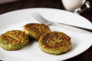 Vegetable patties on a white plate. Vegetarian food.